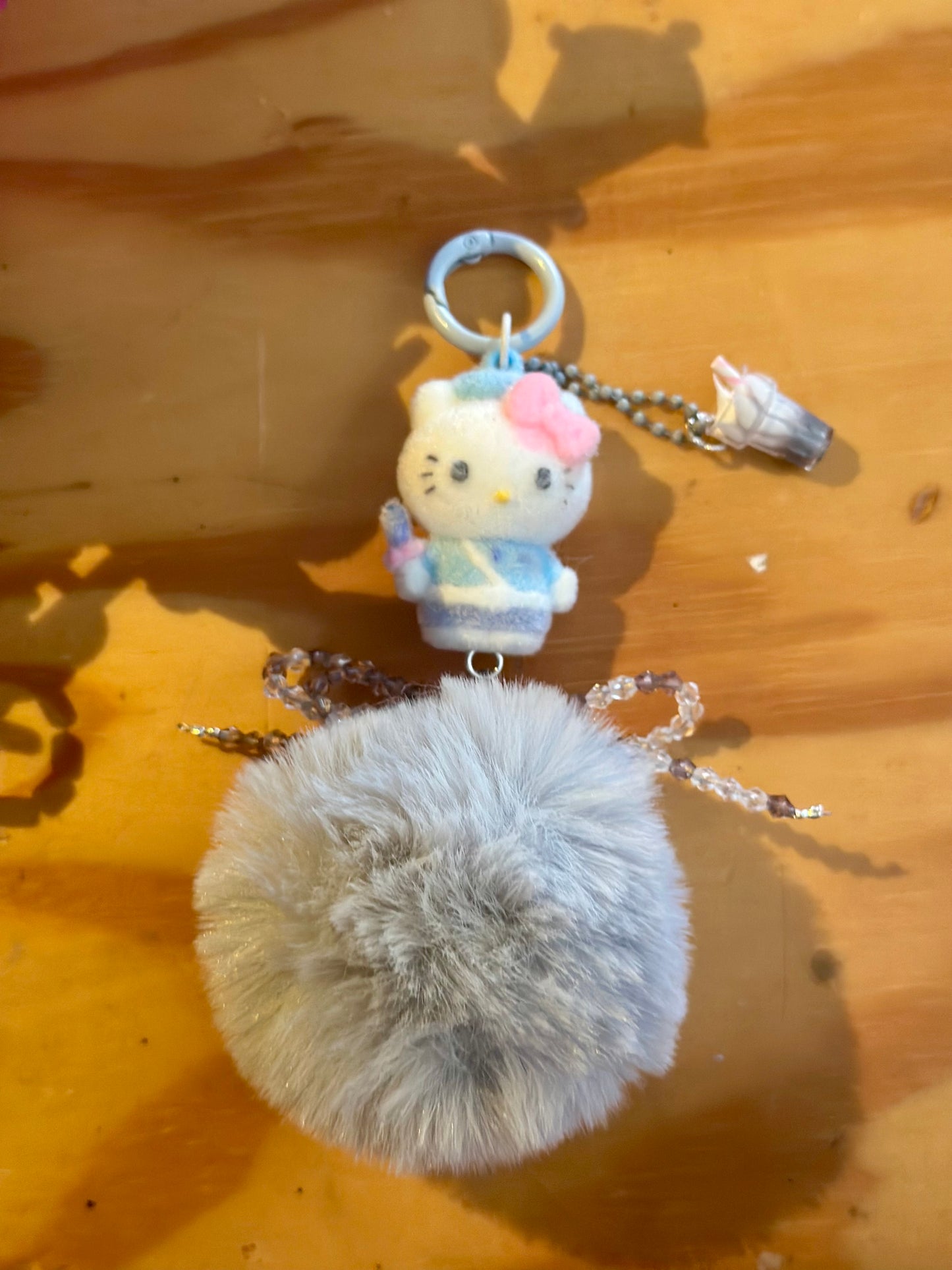 Hello Kitty PomPom phone/bag charm.